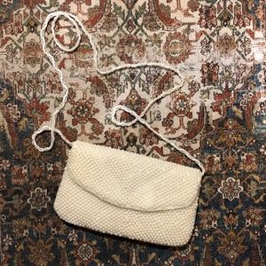 La Regale  soft white pearl crossbody clutch